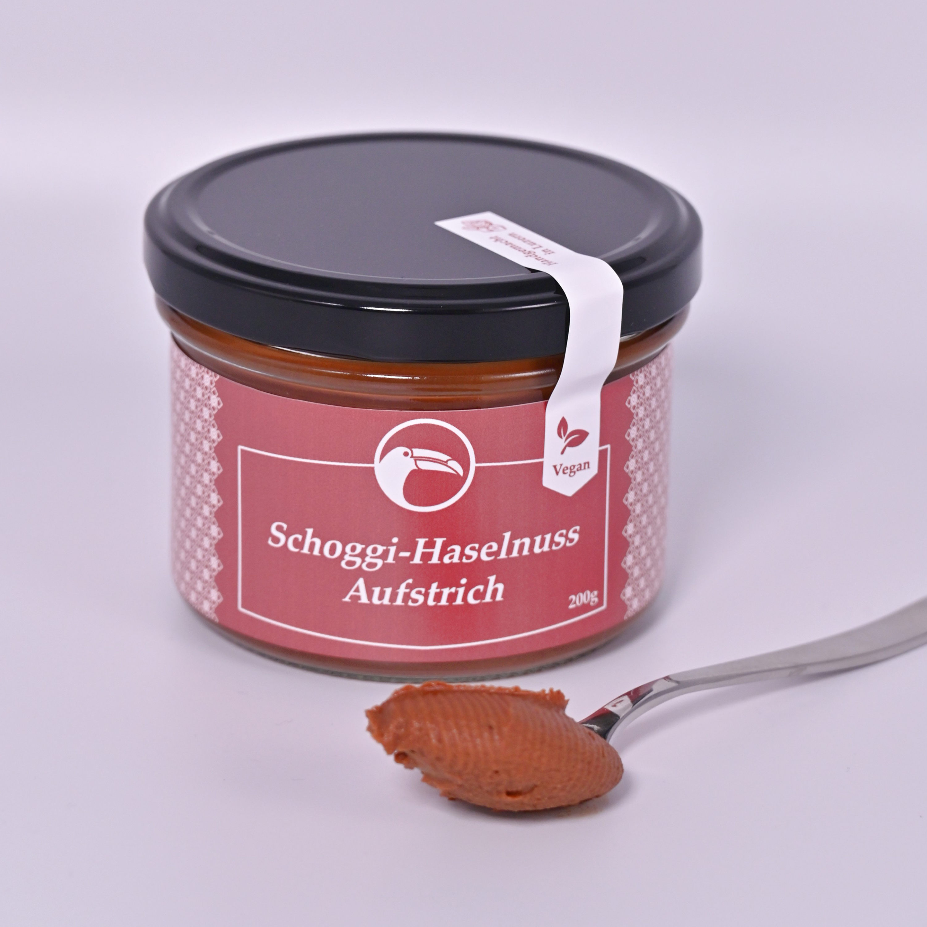 Schoggi-Haselnuss-Aufstrich (200g) | Chani Schoggi Schokoladen-Haselnuss-Aufstrich aus gerösteten Haselnüssen und Edelkakao aus Peru, gemahlen im Granitstein-Melangeur. Handwerklich hergestellt von Chani Schoggi in Luzern.